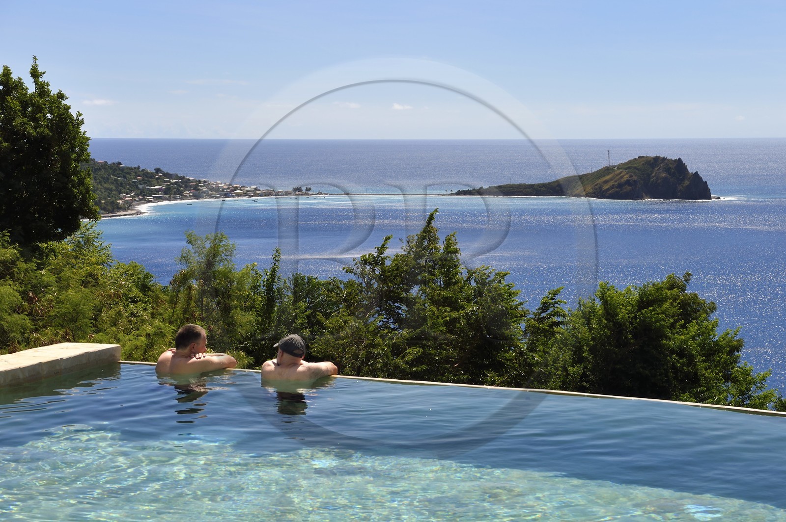 Caribbean, Dominica Island, Soufriere Bay, Soufriere, Jungle Bay hotel overflowing swimming pool