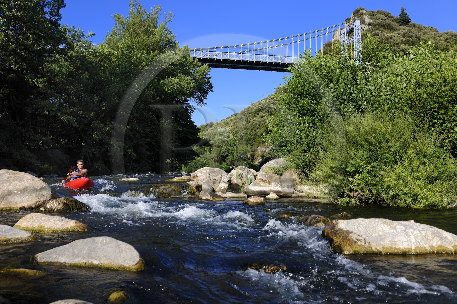 France, Herault, Orb valley, kayaking the river Orb at the moulin de Travassac next to Mons la Trivalle, Sylvain Cathala from Ateliers Rivière Randonnees