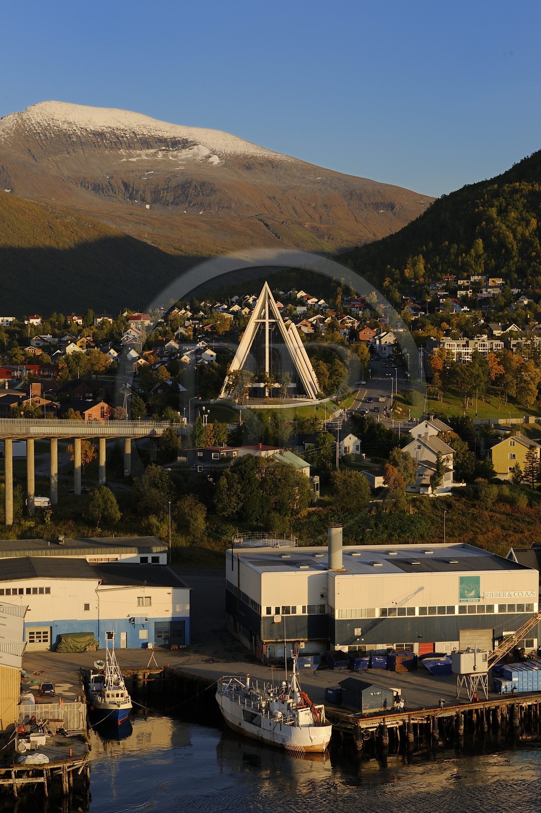 Norway, Troms County, Tromso, the Arctic Cathedral and Tromsdalstind Mount (1238 m) in the background