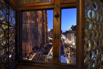 France, Bas Rhin, Strasbourg, old town listed as World Heritage by UNESCO, Place de la Cathedrale, Christmas Market (Christkindelsmarik) and the Notre Dame Cathedral seen from the Maison Kammerzell built in the 15th-16th century converted to a hotel and restaurant