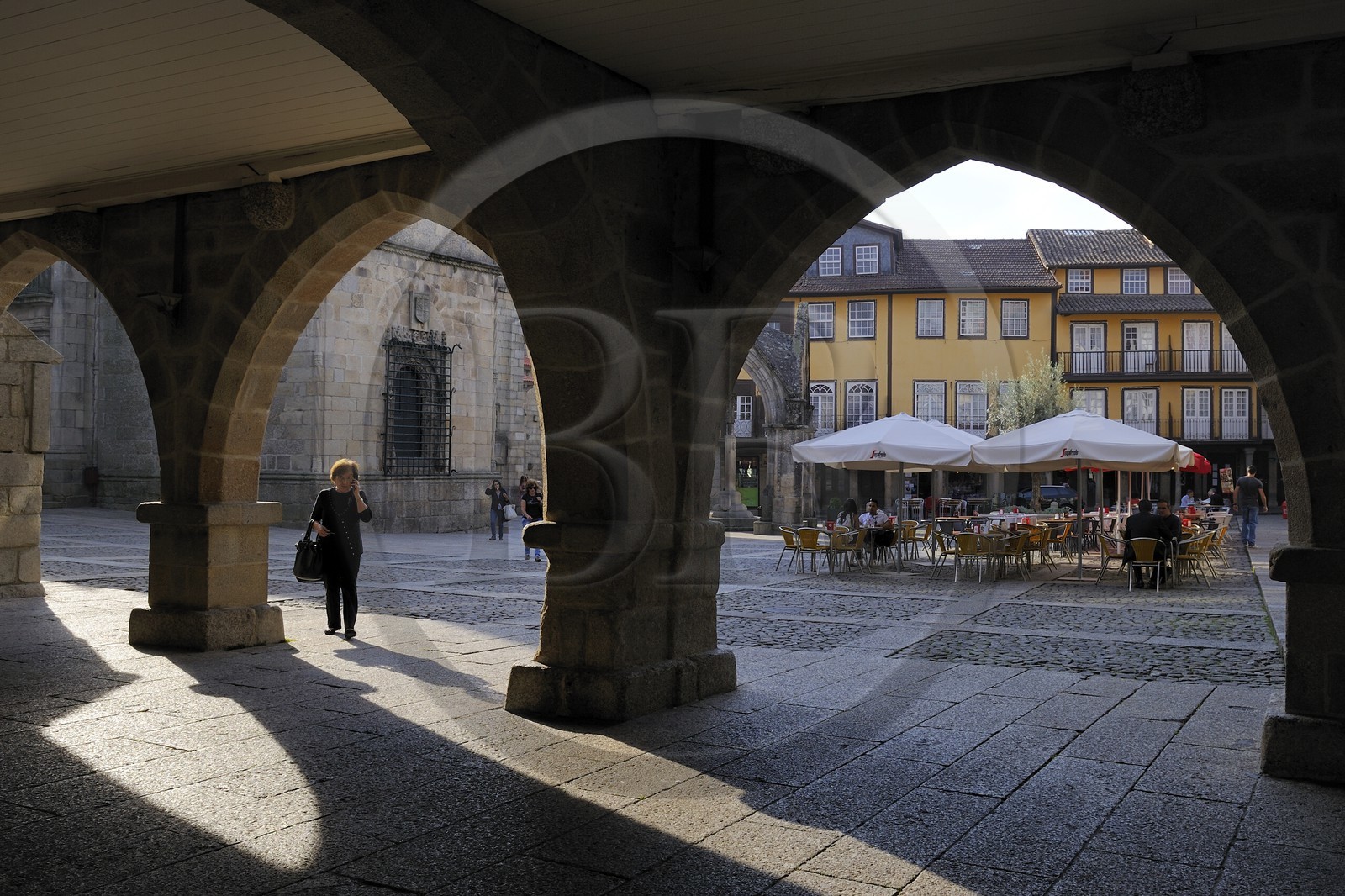 Portugal, Minho region, Guimaraes, town listed as World Heritage by UNESCO, arcades under the former City Hall between the Largo da Oliveira and the Santiago square