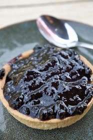 France, Hautes Pyrenees, Saint Lary Soulan, Rioumajou valley, the Rioumajou hospice which has become a hiking refuge and a restaurant, blueberry tartlet