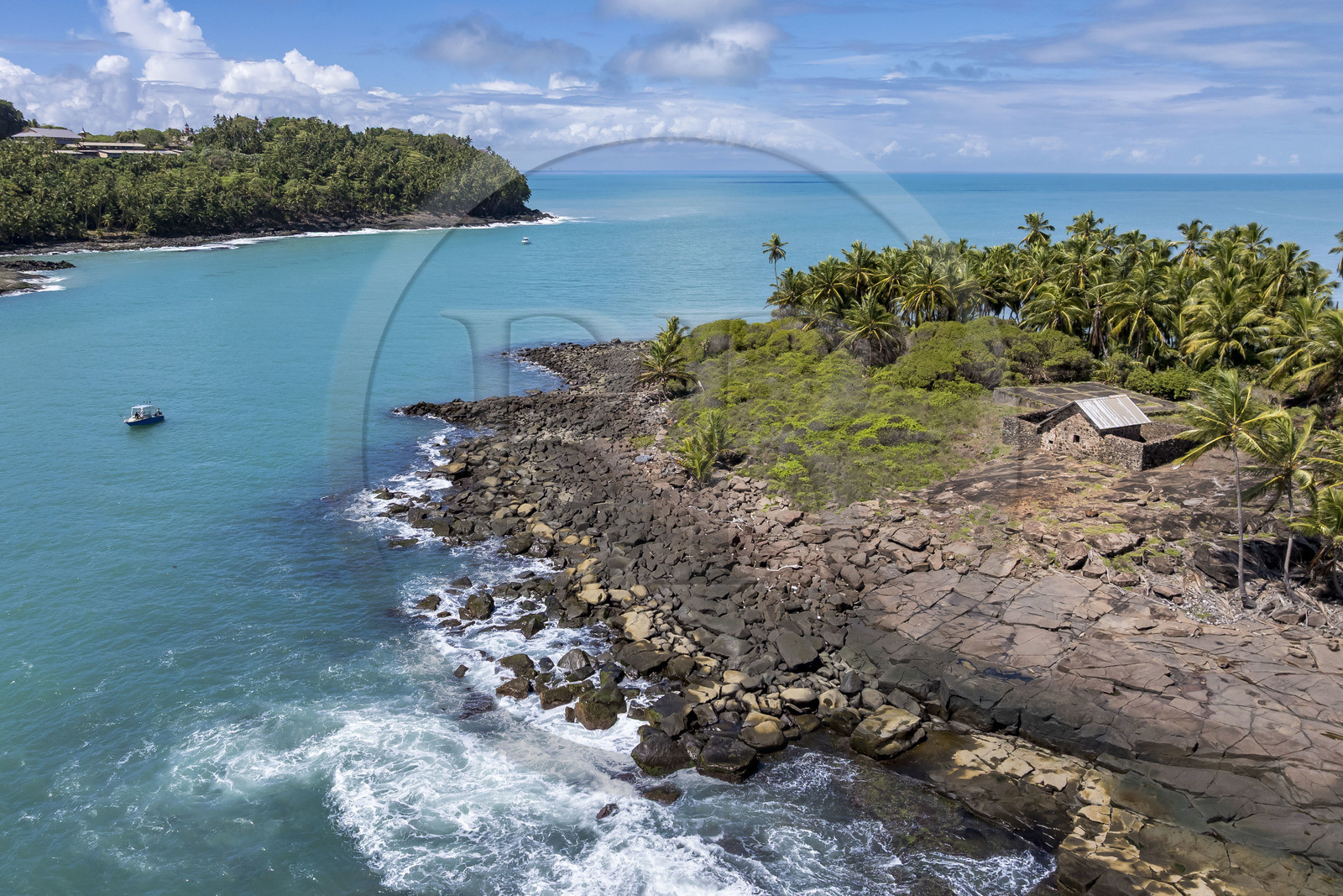 France, French Guiana, Kourou, Salvation Islands (Iles du Salut), Devil's Island and the hut which served as a penal colony for Alfred Dreyfus, Royal island which housed the administration in the background