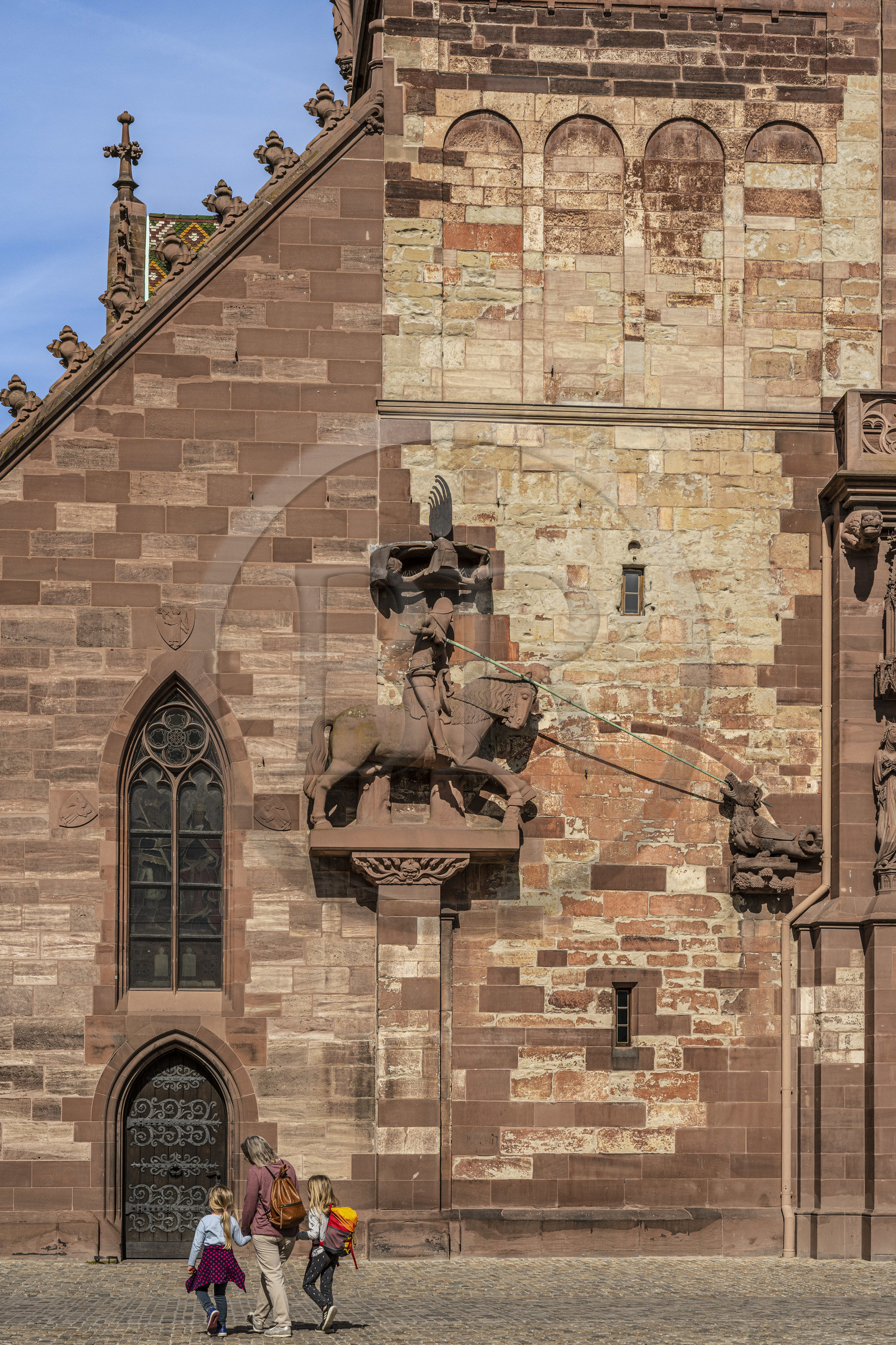 Switzerland, Basel, the Minster or Protestant Cathedral of Our Lady of Basel (Munster), the facade presents a sculpture of Saint George slaying the dragon