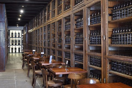 Portugal, Madeira Island, Funchal, Madeira Wine Company, Madeira (natural sweet wine) stored in the wine store of the Blandy's brand (founded in 1811)