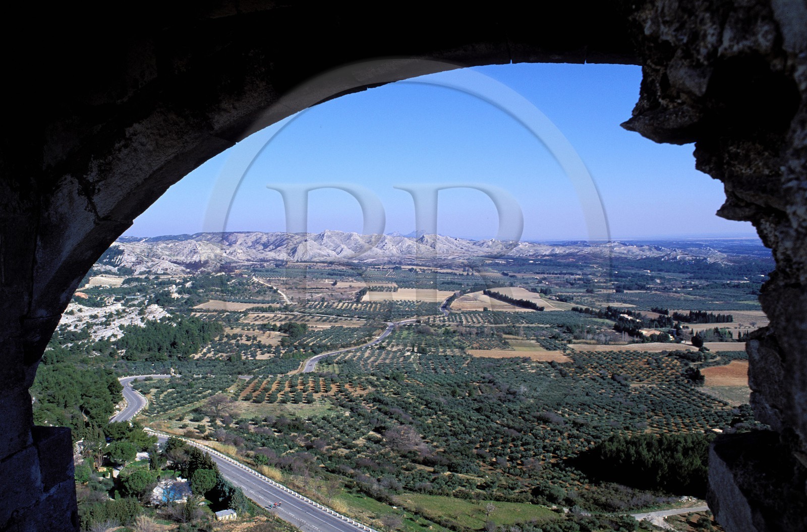 France, Bouches du Rhone, Les Baux de Provence village, labelled Les Plus Beaux Villages de France (The Most Beautiful Villages of France), nestled in the Alpilles foothills as seen from the castle keep