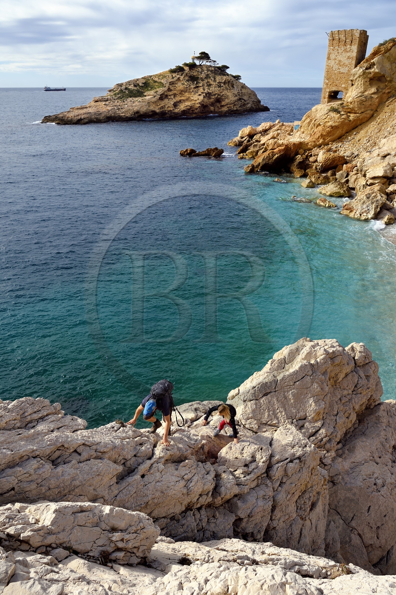 France, Bouches du Rhone, Ensues-la-Redonne towards Marseille, the Cote Bleue (Blue Coast), hike from Niolon to Cap Méjean along the Customs Trail, the small beach and the island of the Erevine Calanque