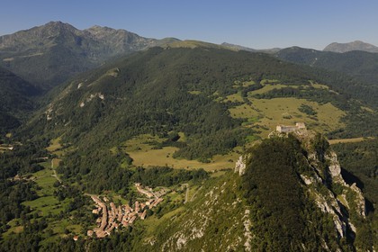 France, Ariege, Pays d' Olmes, Cathar Castle of Montsegur perched on a rock and the Pyrenees..