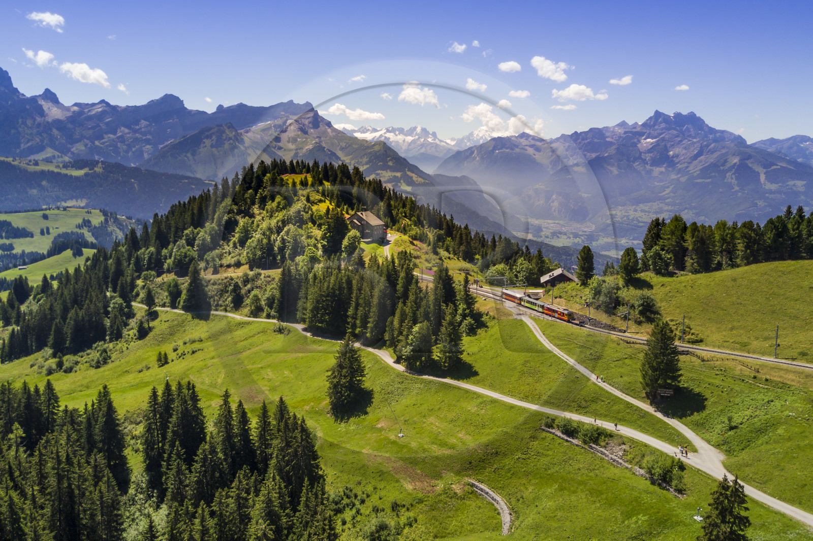Switzerland, Canton of Vaud, Villars-sur-Ollon, train to the Bretaye pass station at the Bouquetins station and Mont-Blanc in the background (aerial view)