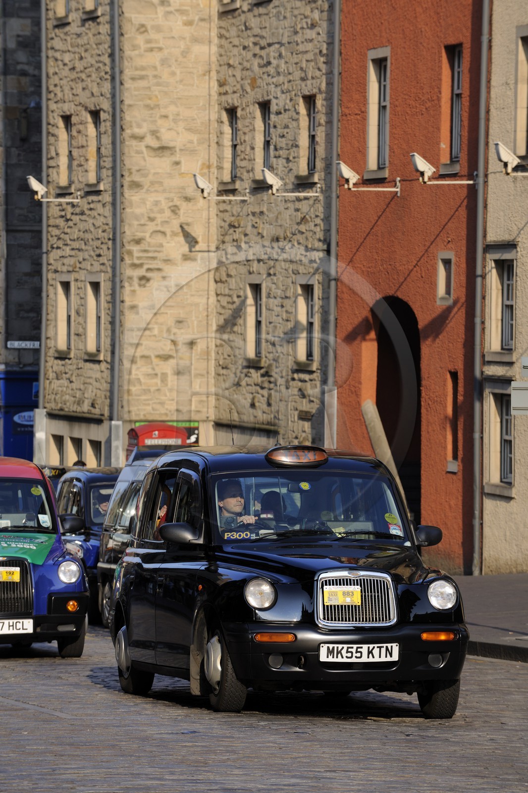 United Kingdom, Scotland, Edinburgh, listed as World Heritage by UNESCO, The Royal Mile, High street, taxi