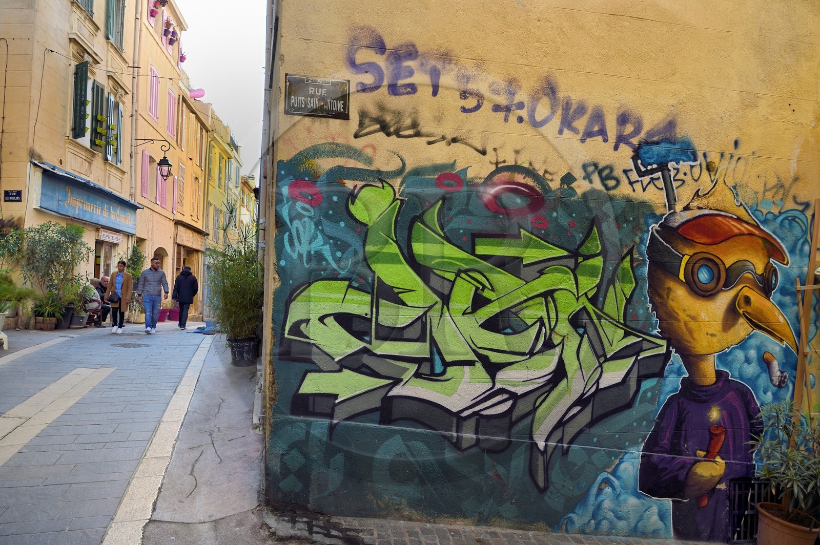 France, Bouches du Rhone, Marseille, Panier district, graffiti at the corner of rue du Panier and rue Puits Saint-Antoine