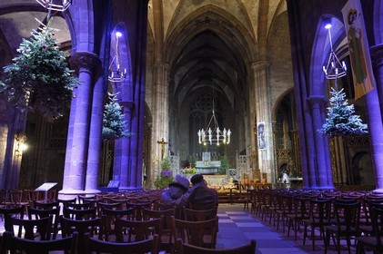France, Bas Rhin, Strasbourg, Selestat, the fir trees suspended under the arches of the nave of the Saint-Georges church are traditionally decorated with apples, bredele, balls taking into account an evolution over time
