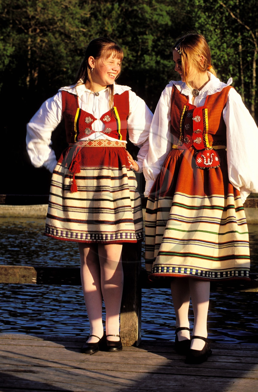 Estonia (Baltic States), Saaremaa Island, girls of the village of Mustila in traditional suit