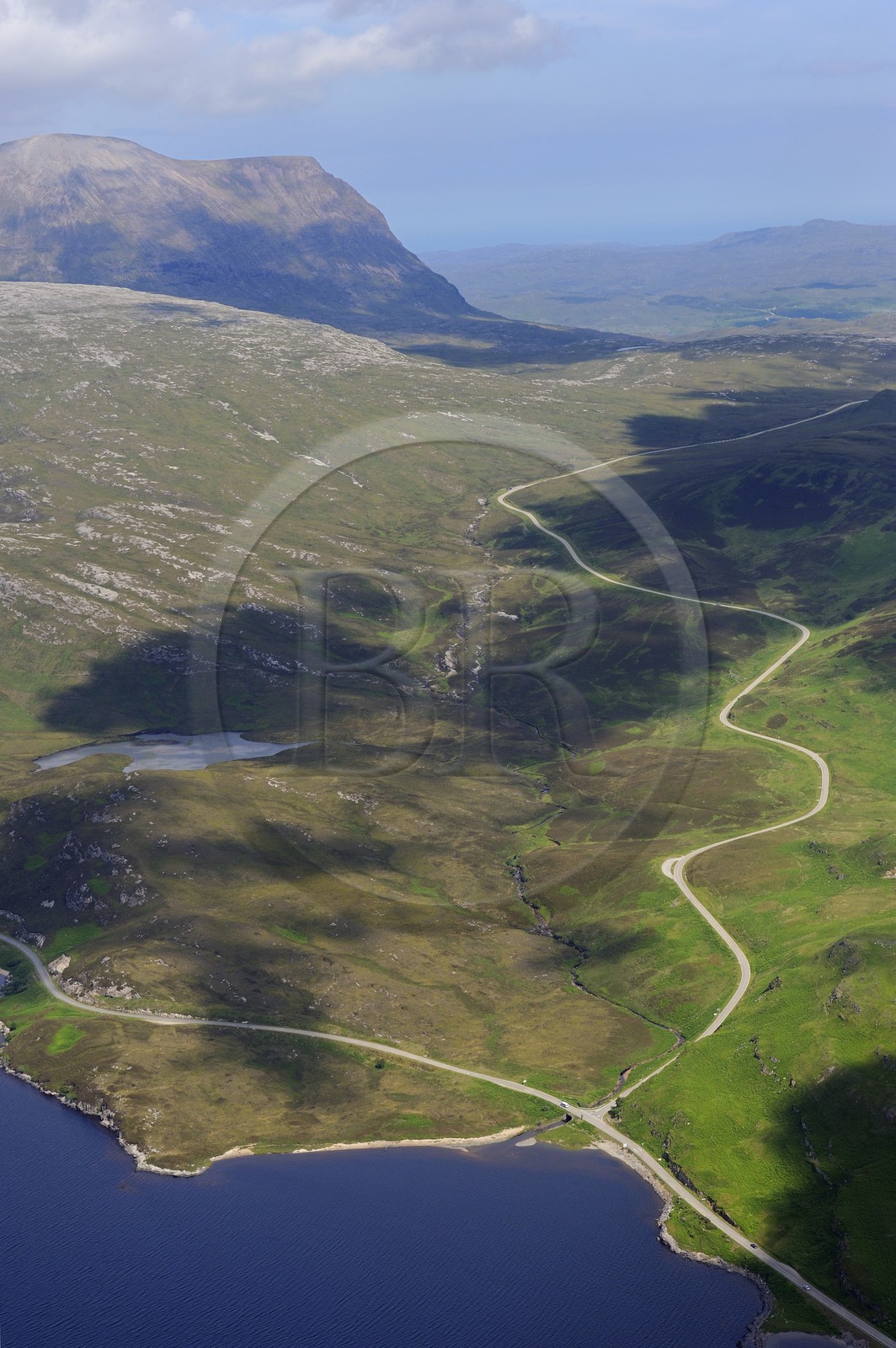United Kingdom, Scotland, Highland, Sutherland, Inchnadamph, Loch Assynt and the A894 road along the Quinag mount (aerial view)