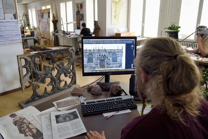 France, Bas Rhin, Strasbourg, old town listed as World Heritage by UNESCO, workshops of the Oeuvre Notre-Dame Foundation, design office, Aymeric Zabollone stonemason and researcher uses photogrammetry to prepare the next conservation-restoration project of the cathedral