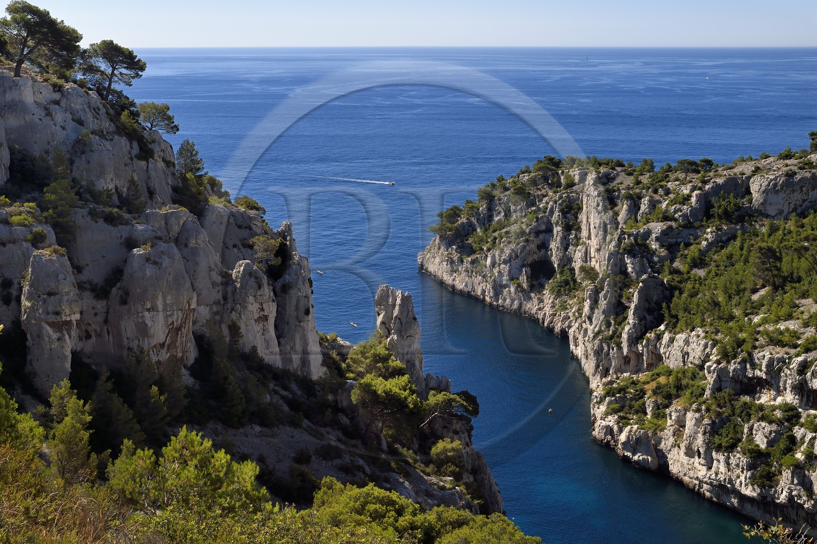 France, Bouches du Rhone, Marseille, National Park of the Calanques, Calanque En Vau (cove) and in the center the rock called the Finger of God (request for authorization necessary before publication)