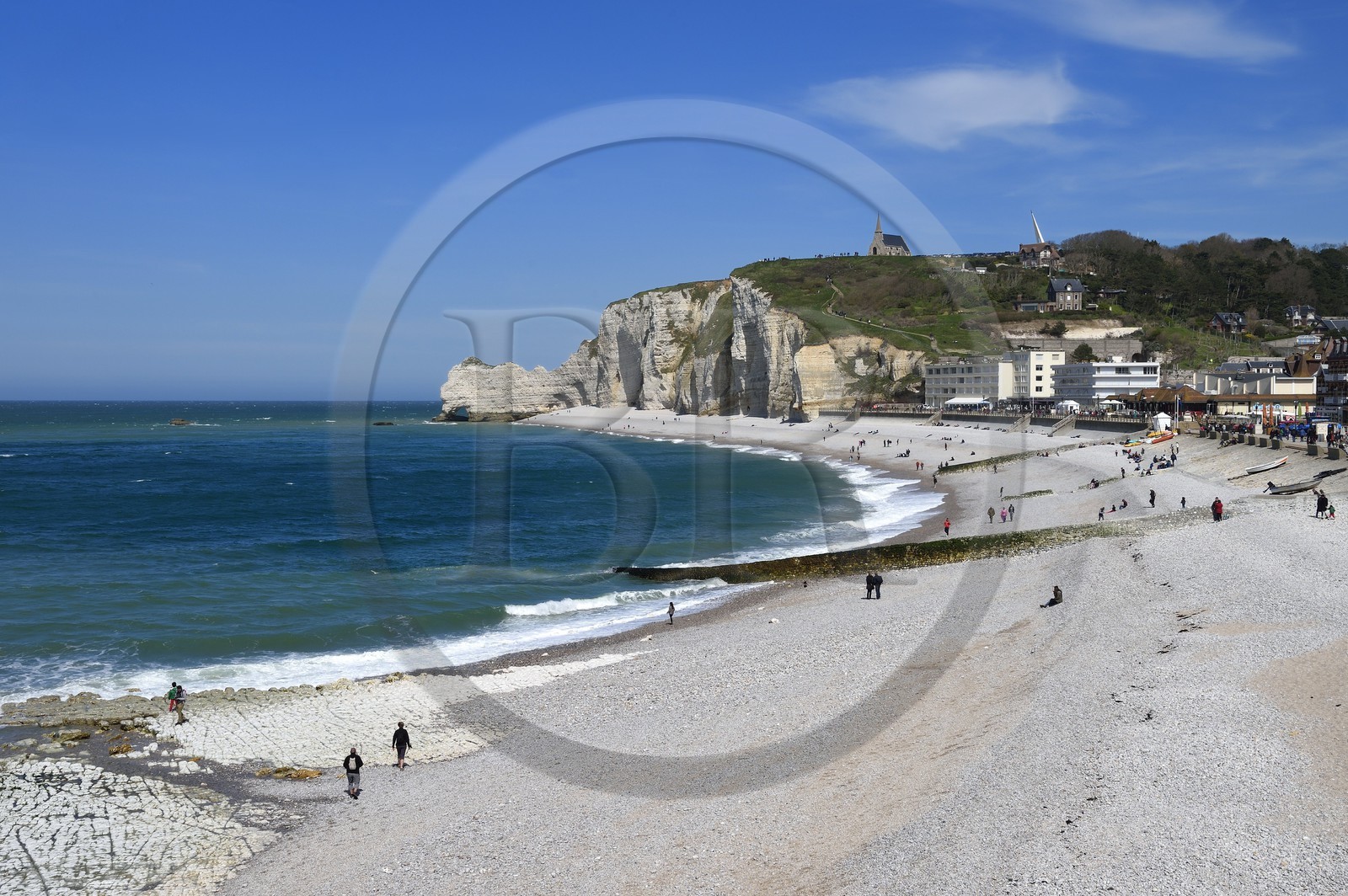 France, Seine-Maritime, Pays de Caux, Alabaster Coast (Cote d'Albatre), Etretat, the beach and Amont cliff overlooked by the Notre-Dame-de-la-Garde church
