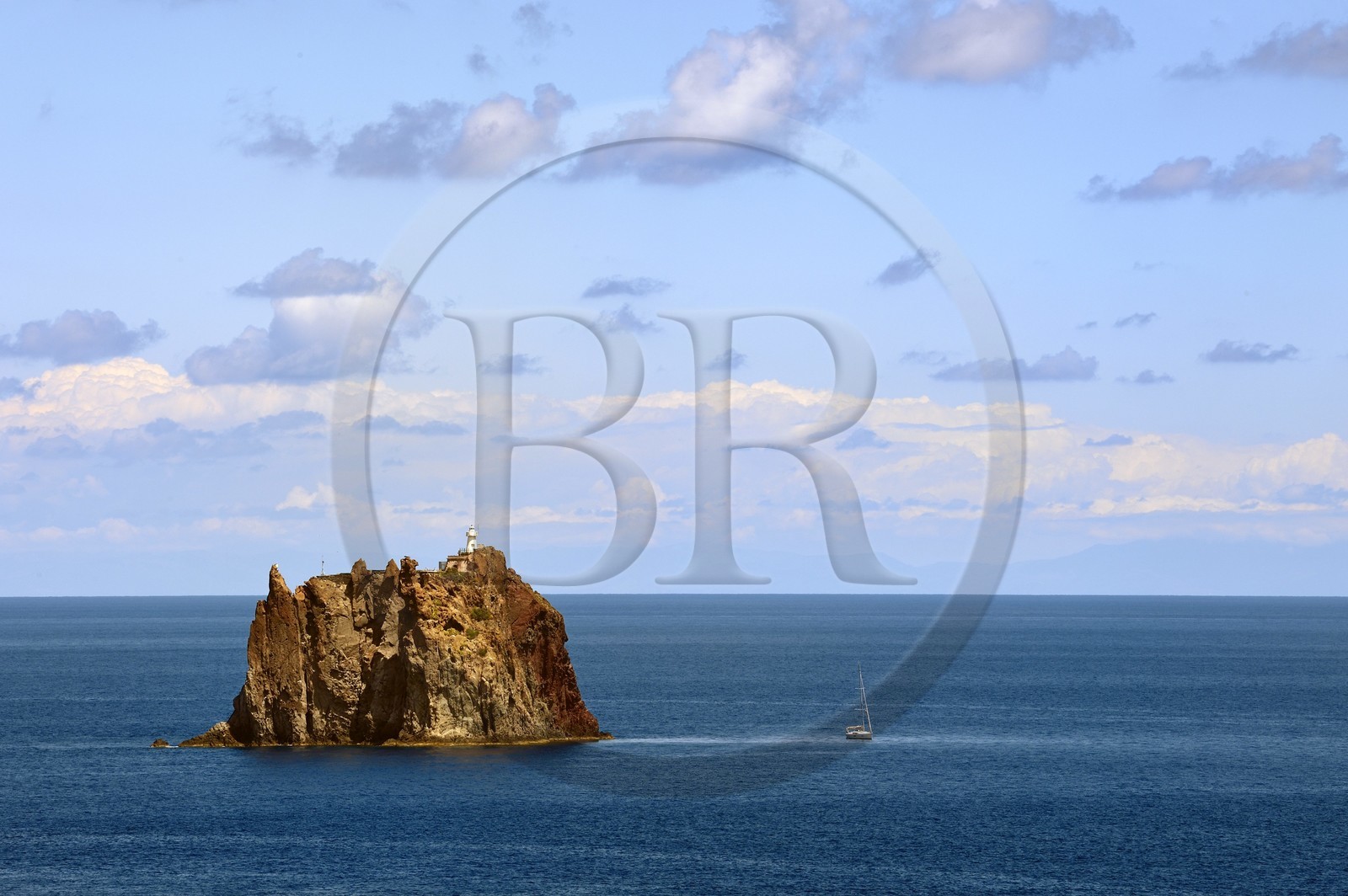 Italy, Sicily, Aeolian Islands, listed as World Heritage by UNESCO, Stromboli island, islet of Strombolicchio, rock of solidified magma from an old volcanic cap, now occupied by a lighthouse