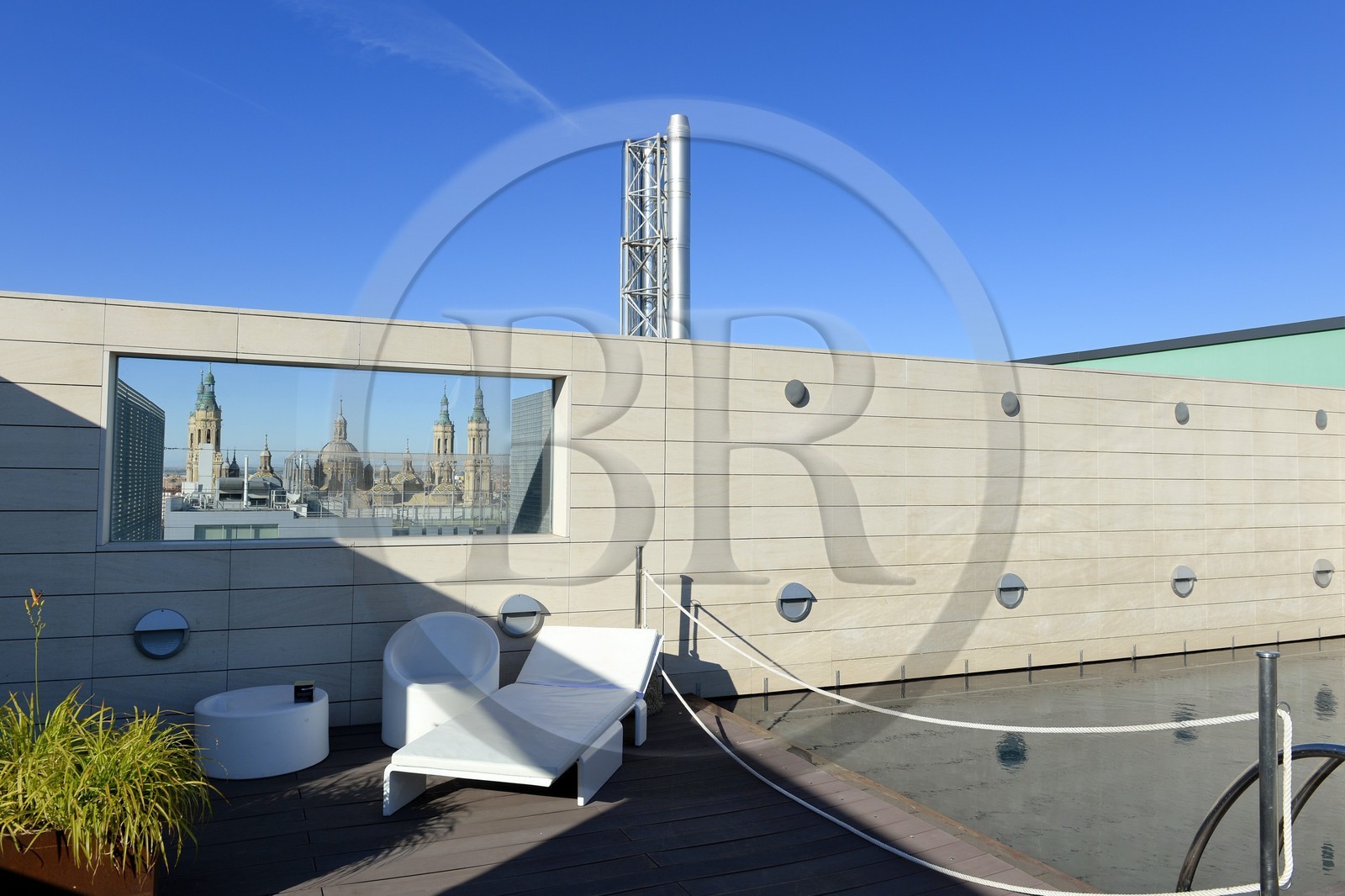 Spain, Aragon, Zaragoza, Hotel Alfonso roof top and the Basilica del Pilar (Our Lady of the Pillar) in the window opening