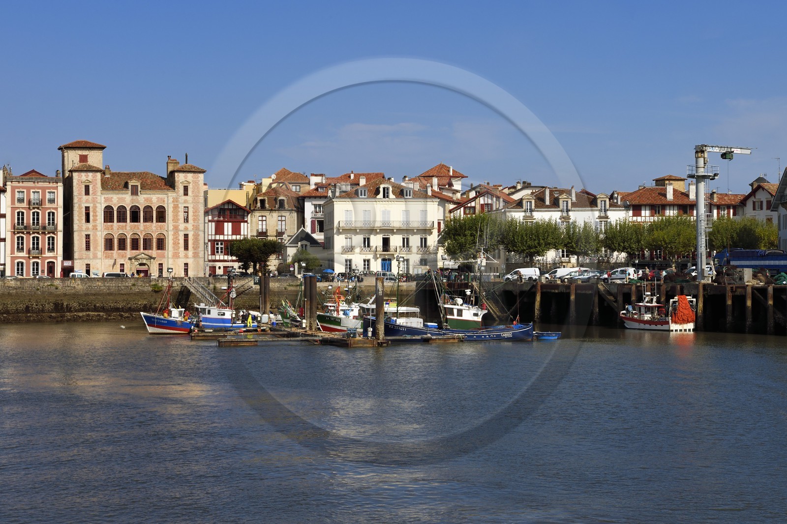 France, Pyrenees Atlantiques, Basque Country, Saint Jean de Luz, the fishing port and the Maison de l'Infante in the background on the left