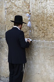 Israel, Jerusalem, holy city, the old town listed as World Heritage by UNESCO, the Western Wall part of the retaining walls of the Temple Mount built by Herod the Great, Orthodox Jew praying