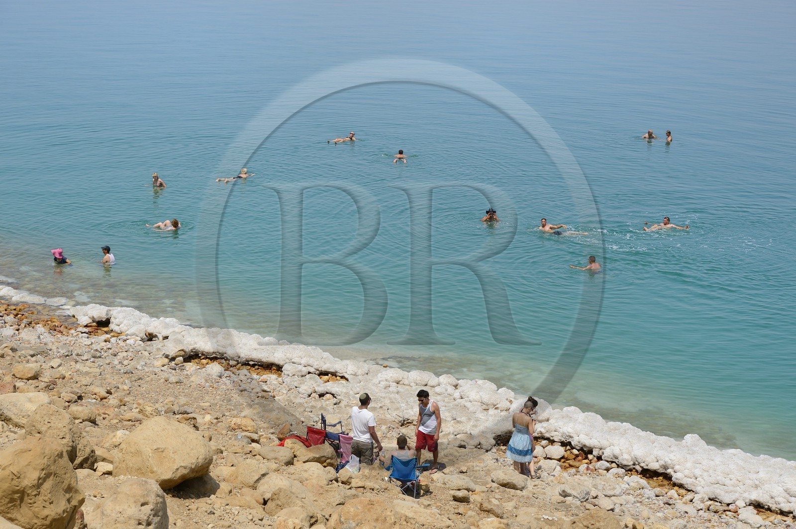 Israel, Southern District, swimmers at Ein Gedi Beach on the Dead Sea, saline concretions