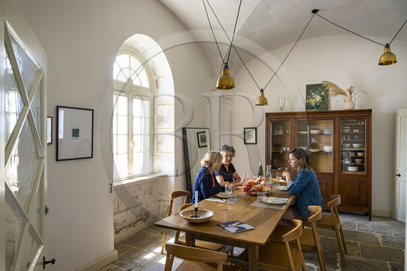 France, Finistère, Abers Country (Pays des Abers), Virgin Island, the Virgin Island lighthouse, the old lighthouse from 1845 transformed into an eco-lodge in the former guards' accommodation, seafood platter for dinner in the dining room