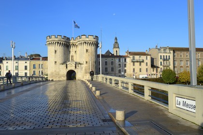 France, Meuse, Verdun, Porte Chaussee, gate of the 15th century, official entry of the city since its construction, defense tower of the great wall that encircled the city in the medieval seen from the Nation Place and the bridge over the Meuse River