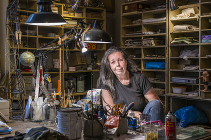 France, Vaucluse, Avignon, Interior designer Pascale Palun in her Vox Populi workshop-boutique, specializing in the creation of lighting and decorative objects