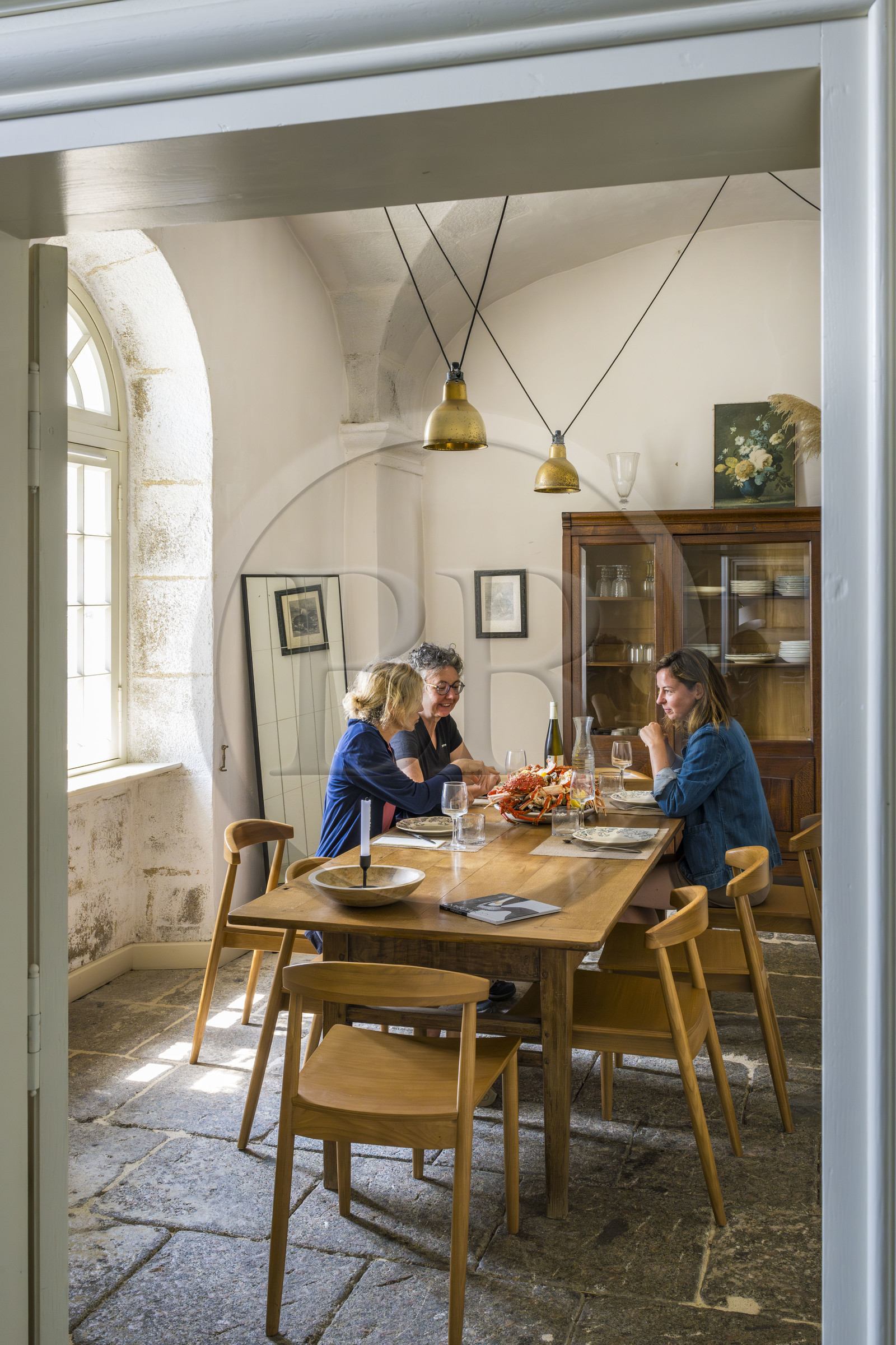 France, Finistère, Abers Country (Pays des Abers), Virgin Island, the Virgin Island lighthouse, the old lighthouse from 1845 transformed into an eco-lodge in the former guards' accommodation, seafood platter for dinner in the dining room