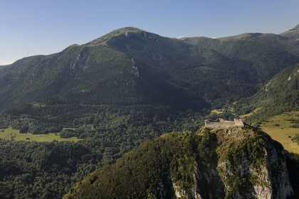 France, Ariege, Pays d' Olmes, Cathar Castle of Montsegur perched on a rock and the Pyrenees..
