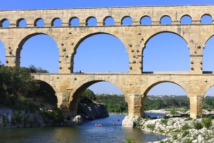 France, Gard, Pont du Gard listed as World Heritage by UNESCO, Roman aqueduct over Gardon River, canoeing