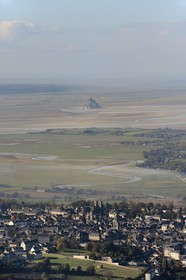 France, Manche, Bay of Mont Saint Michel, listed as World Heritage by UNESCO, Mont Saint Michel at low tide and the city of Avranches in the foreground (aerial view)