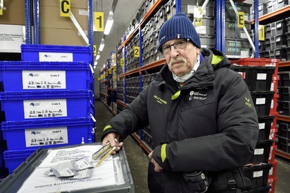 Norway, Svalbard, Spitzbergen, Longyearbyen, Svalbard Global Seed Vault (Seed Bank), seed storage room artificially maintained at -18°C, there are nearly 900000 samples deposited, from 200 countries of origin and 73 depositor institutes, Roland von Bothmer (on the right) presents the new means of storing seeds in vacuum aluminum bags and old ones in glass tubes