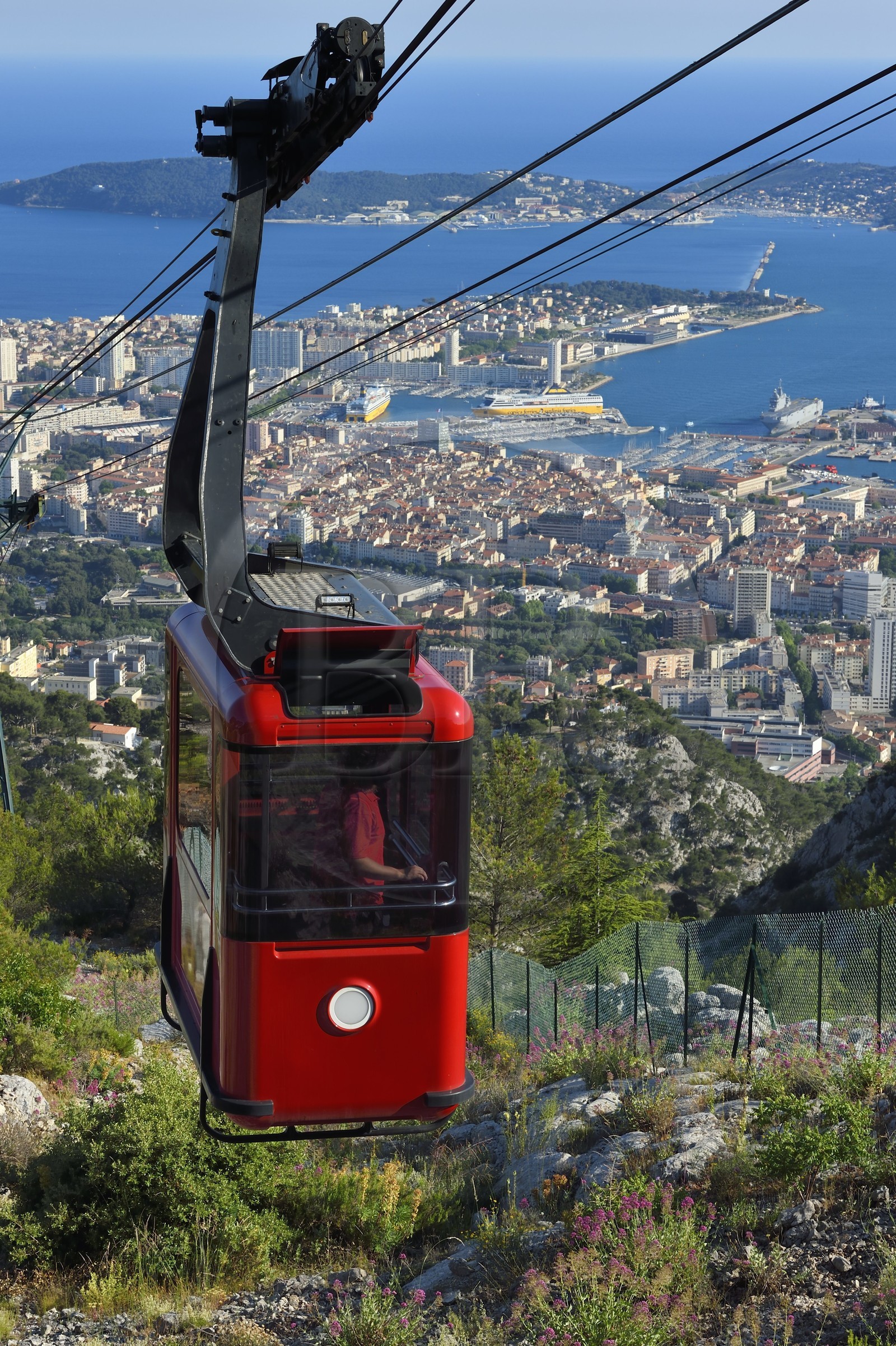 France, Var, Toulon, the cable car from the Mont Faron, the city and the naval base (Arsenal) in the Rade (Roadstead) in the background