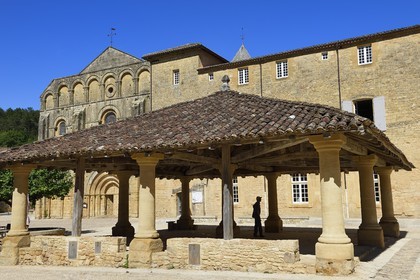 France, Dordogne,  Perigord Noir, Le Buisson de Cadouin, stage on the Camino de Santiago (Way of St. James) listed as World Heritage by UNESCO, former cistercian abbey church and the market Hall