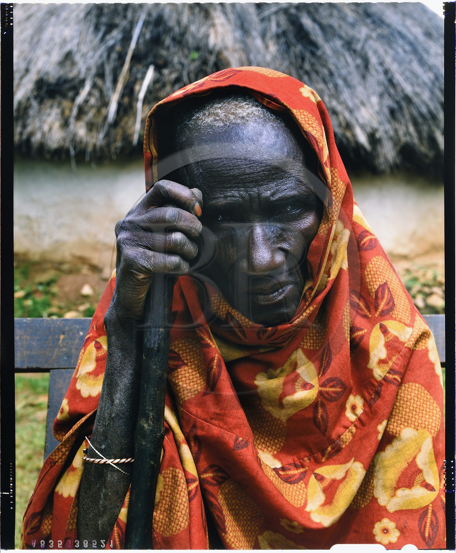 Burundi, Bujumbura Province, Ijenda area, old Tutsi woman, wife of the old man who was nearly 80 years following his words during shooting (4x5 reversal film reproduction)