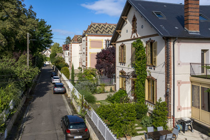 France, Cote d'Or, Climats terroirs of Burgundy listed as World Heritage by UNESCO, Beaune, Fondet villas development built at the end of the 19th century (aerial view)