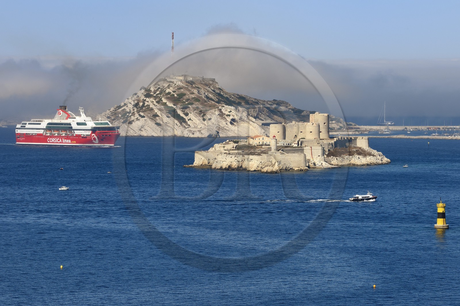 France, Bouches du Rhone, Marseille, Calanques National Park, archipelago of Frioul islands, Corsica Linea Ferry arriving from Corsica and the Chateau d'If in the foreground