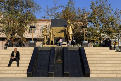 Turkey, Istanbul, Asian side, Ataturk statue showing as a teacher nearby Kadikoy Pier