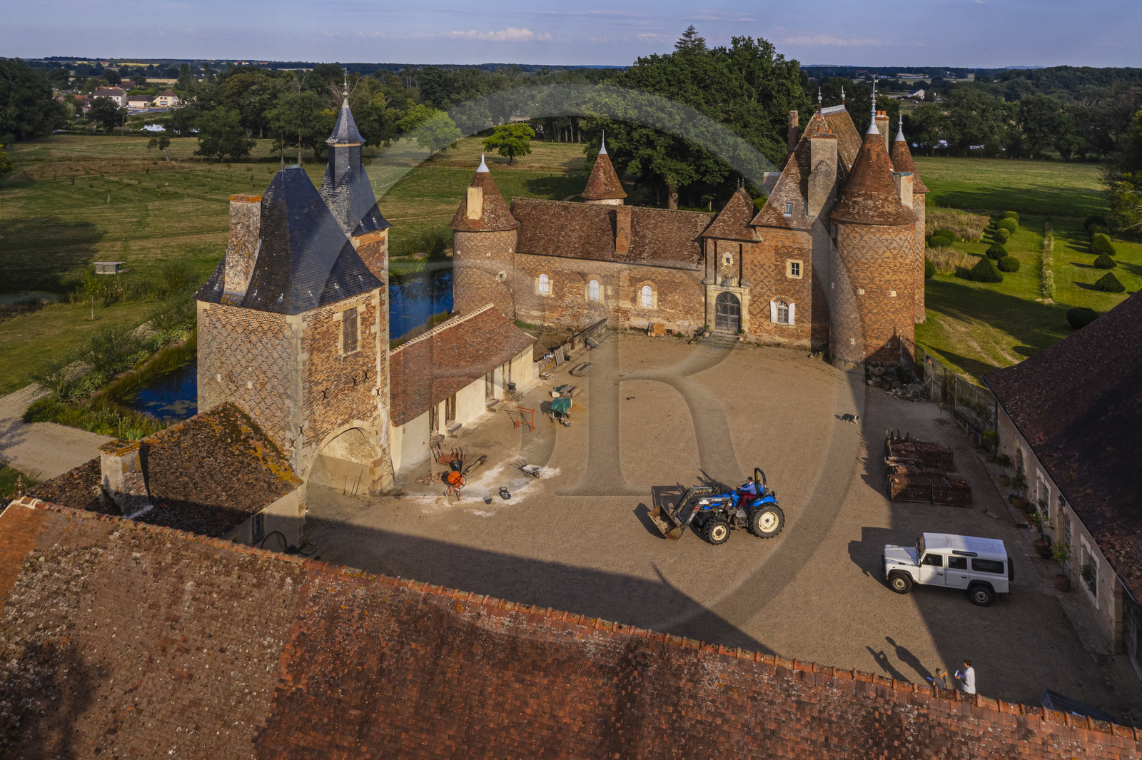 France, Allier (03), former province of Bourbonnais, Chapeau, Chateau de la Cour (15th century to late 16th century), with a decor of black brick herringbone on a background of red bricks (aerial view)