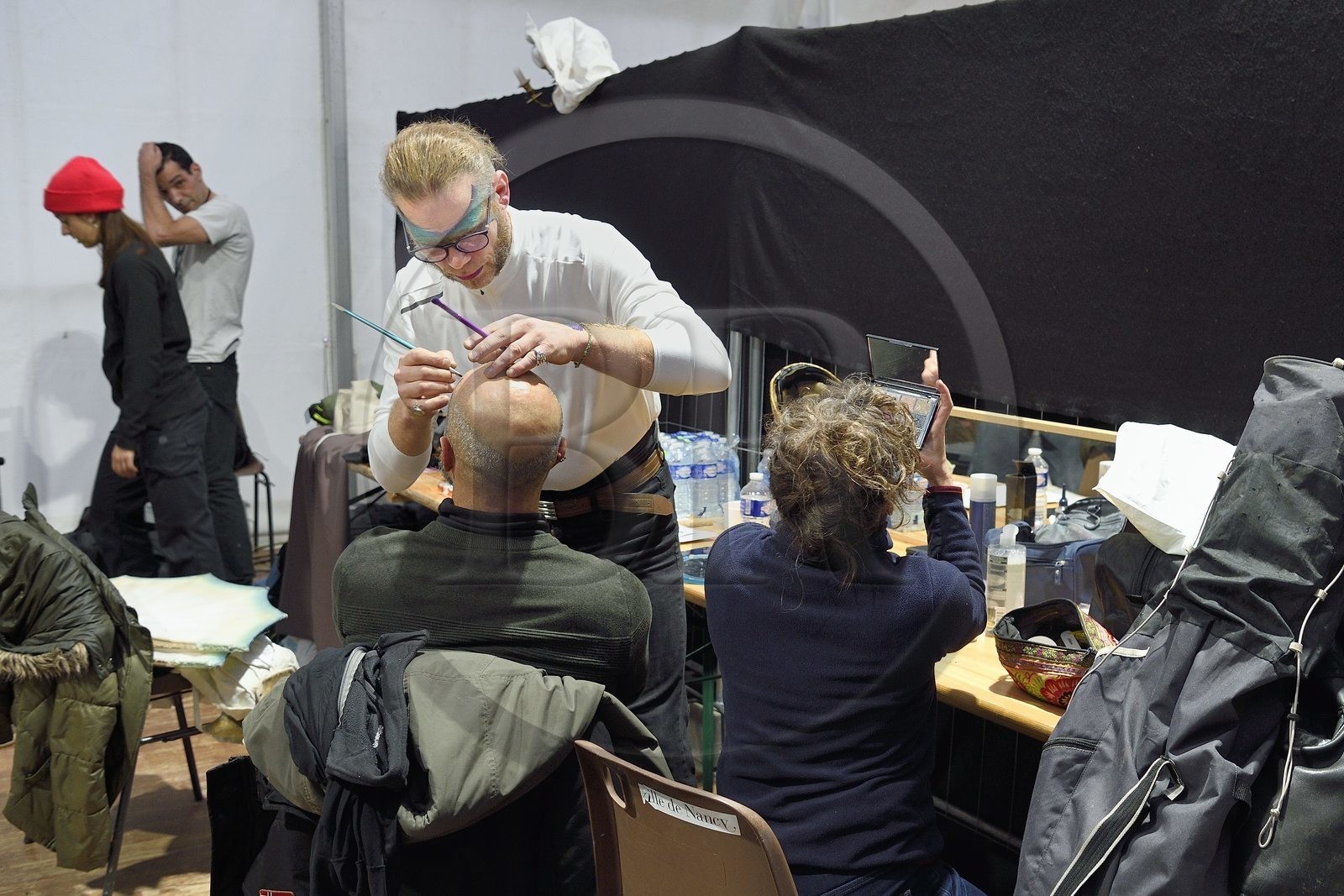 France, Meurthe-et-Moselle, Nancy, preparations for the parade of Saint-Nicolas place Carnot, make-up session for the Company Remue Ménage