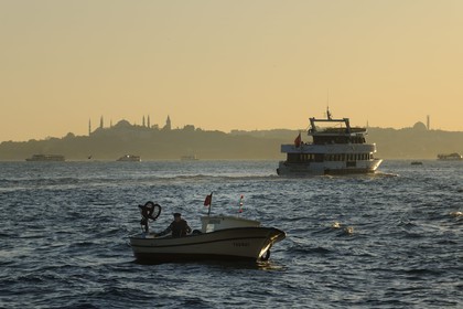 Turkey, Istanbul, fishermen boats on the Bosphorus Strait, the Golden Horn Strait in the background