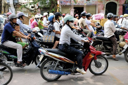Vietnam, Hanoi, motorcycle traffic in the old city