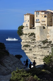 France, Corse du Sud, Bonifacio, the old town or Upper Town perched on limestone cliffs more than 60 meters high and connecting ferry to Sardinia