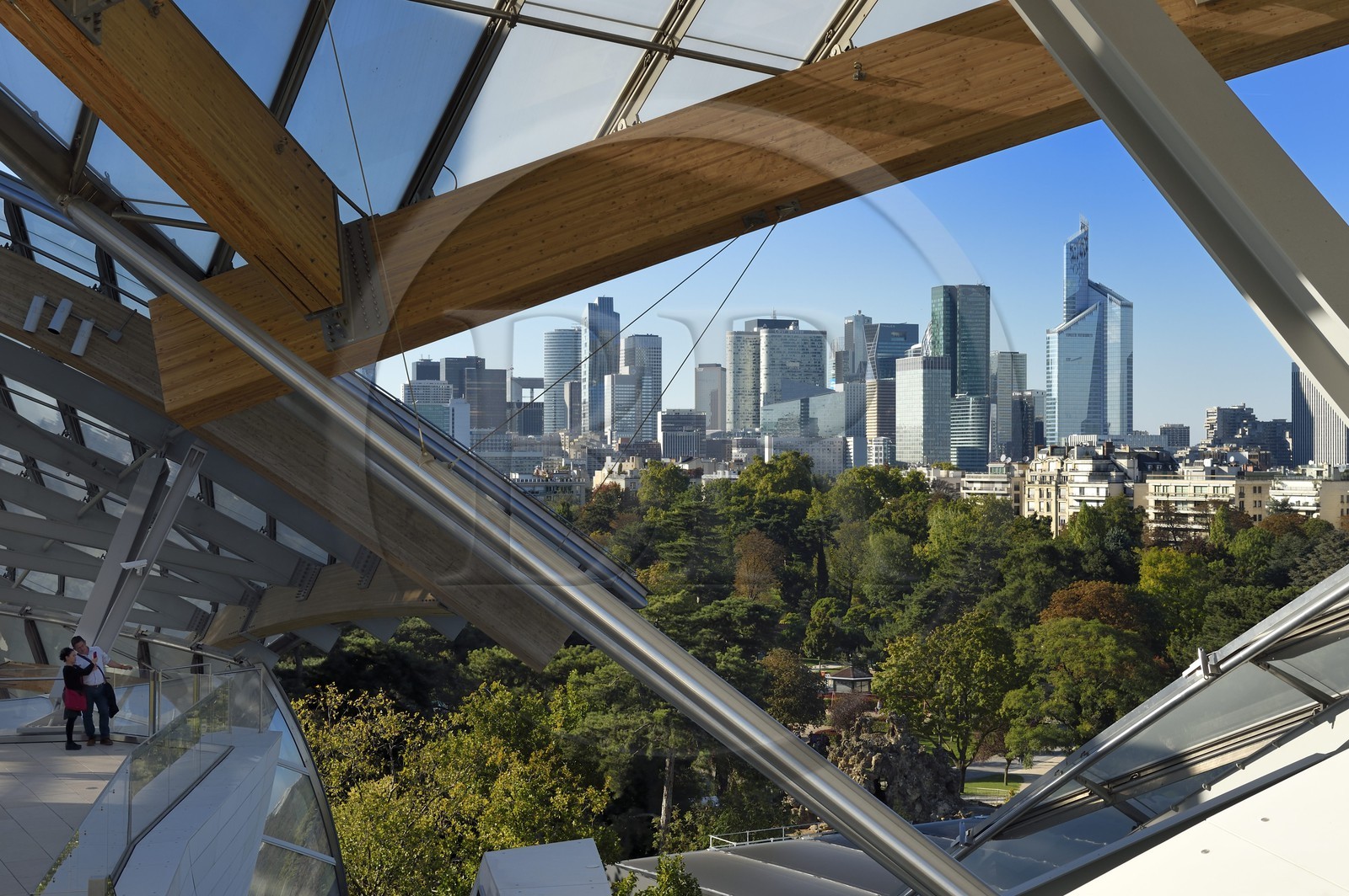 France, Paris, Louis Vuitton Foundation by architect Frank Gehry and La Defense in the background