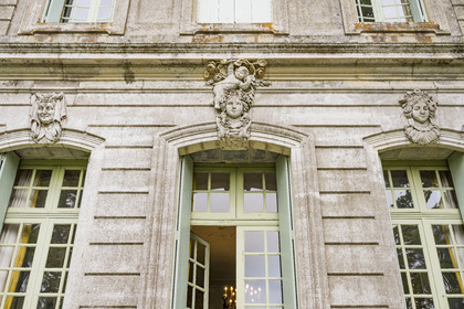 France, Herault, Lavérune, Chateau de l'Engarran, private mansion from the second half of the 18th century called Montpellier Folie, the three ages of life on the mascarons above the windows