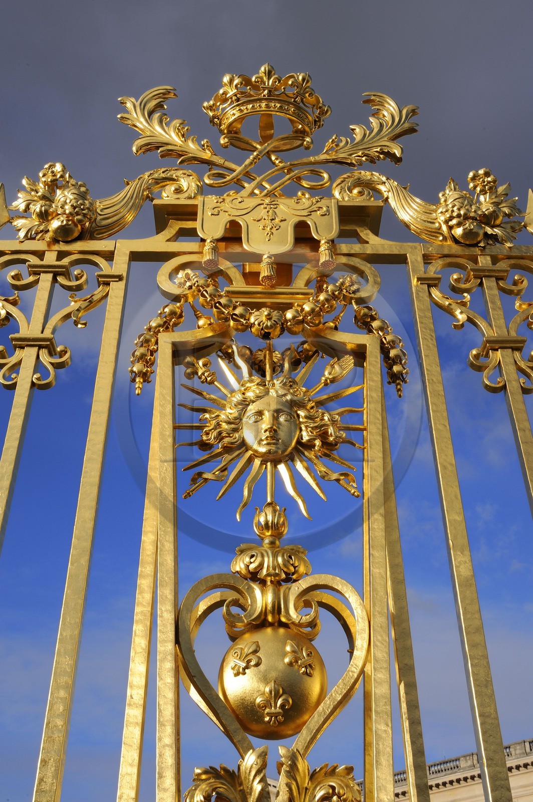 France, Yvelines, Chateau de Versailles, listed as World Heritage by UNESCO, detail of the Royal Gate drawn by Mansart (restored in June 2008) which separating the Royal Courtyard