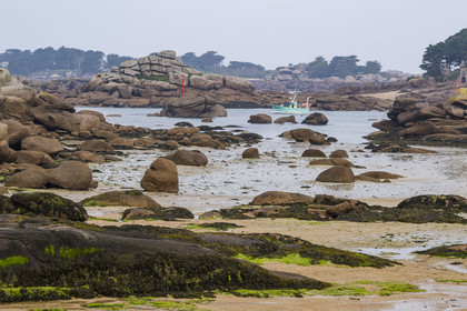 France, Cotes-d'Armor, Cote de Granit Rose, Perros-Guirec, fishing boat in the exit channel of the natural port of Ploumanac'h