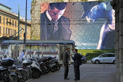Italy, Lombardy, Milan, tramway and billboard for fashion via dell'Orso